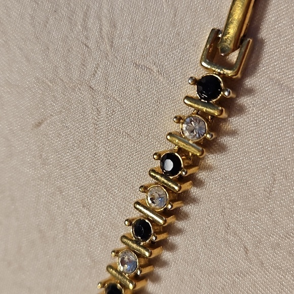 NAPIER Vintage Rhinestones, Black Stones, and Gold Tone Tennis Bracelet - Picture 4 of 10